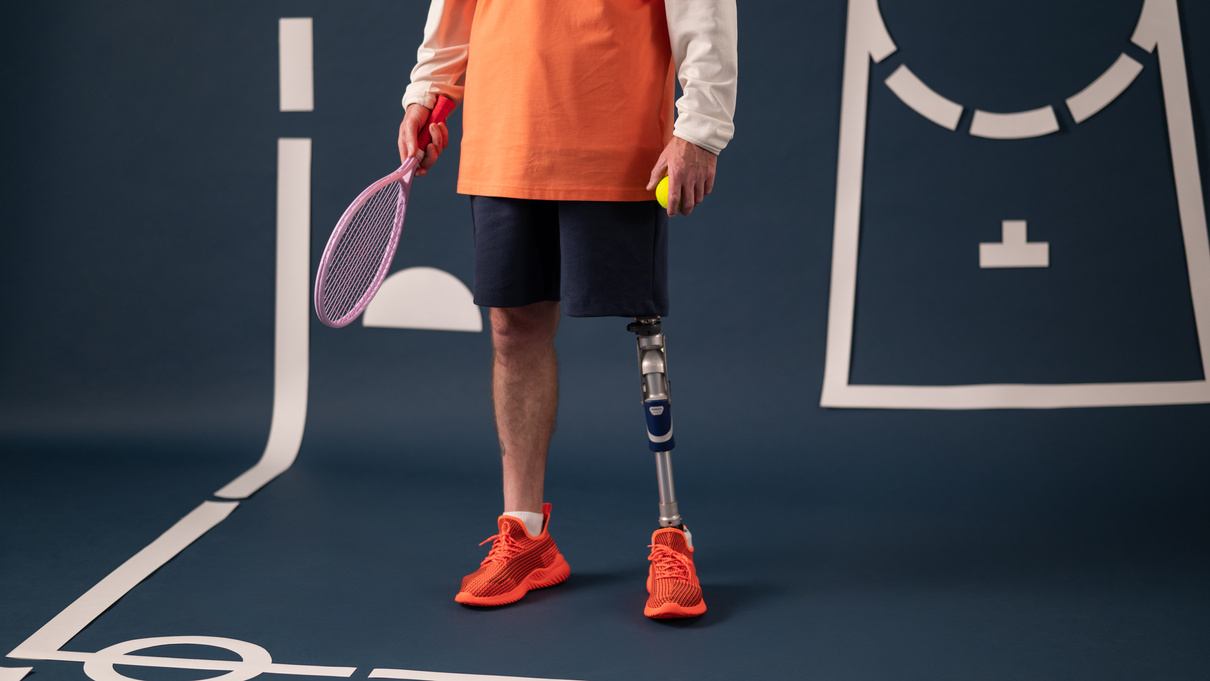 Motion Person with Disability Holding Tennis Racket and Ball